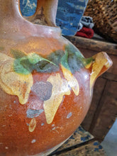 Load image into Gallery viewer, Antique French Cruche Water Jug Rustic Provence Farmhouse country Pottery sitting on blue painted farmhouse chair with a large unpainted Swedish ships trunk behind with a rustic French basket filled with dried roses on top in the Dusty Gems interiors Nantwich shop