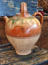 Load image into Gallery viewer, Antique French Cruche Water Jug Rustic Provence Farmhouse country Pottery sitting on blue painted farmhouse chair with a large unpainted Swedish ships trunk behind with a rustic French basket filled with dried roses on top in the Dusty Gems interiors Nantwich shop