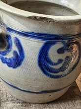 Load image into Gallery viewer, Ceramic pot with blue decorative patterns on a textured surface