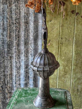 Load image into Gallery viewer, Late 18th century French provincial tinned altar cross with trefoil terminals and radiating glory standing on a rustic green painted wooden table against weathered painted boards and dried flowers.
