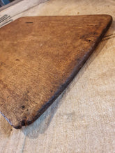 Load image into Gallery viewer, Antique French Rustic Farmhouse Bread Board Cutting Board sitting on top of a French Linen Flour sack on top of a primitive wooden french farm house table in the Dusty Gems Interiors Nanntwich shop