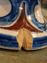 Load image into Gallery viewer, Close-up of a ceramic dish with blue and brown design on a wooden surface
