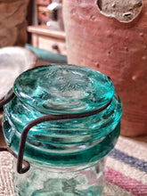 Load image into Gallery viewer, vintage La Lorraine French Half Liter storage jar French country  kitchen sitting on french country table on old french linen sack french rustic interior Dusty Gems interiors best french country items 