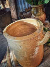 Load image into Gallery viewer,  Antique French Confit pot Storage Jar Rustic country farmhouse kitchen confit pot sitting on french linen grain sack for french country look large french chopping board in background and dried roses primitive decor dusty gems interiors Nantwich 