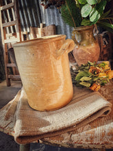 Load image into Gallery viewer,  Antique French Confit pot Storage Jar Rustic country farmhouse kitchen confit pot sitting on french linen grain sack for french country look large french chopping board in background and dried roses primitive decor dusty gems interiors Nantwich 