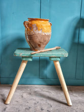 Load image into Gallery viewer, Antique French Country Confit Pot Rustic Farmhouse Storage jar 19th century, mustard yellow glaze sitting on blue and white painted primitive farmhouse stool, dusty gems interiors nantwich 