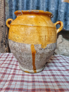 Antique French Country Confit Pot Rustic Farmhouse storage Jar 19th century mustard yellow and Terracotta sitting on antique french linen checked textile. dusty gems interiors nantwich