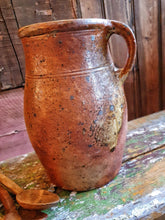 Load image into Gallery viewer, Antique French Country Rustic Cider Jug 19th Century Farmhouse sitting on antique Swedish painted farmhouse bench with antique handcarved spoons next to the Jug overall primitive farmhouse kitchen look Dusty Gems Interiors Nantwich 