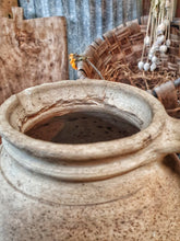 Load image into Gallery viewer, Antique French Rustic Sandstone Pitcher Stoneware Farmhouse Jug on french country furniture french baskets in the background french country kitchen confit pot stoneware Dusty gems interiors nantwich