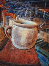 Load image into Gallery viewer, French country Antique Confit pot Rustic Farmhouse primitive olive oil storage jar sitting on french country made wooden farmhouse stool with old antique wooden crates and dried lavender in the background dusty gems interiors nantwich 