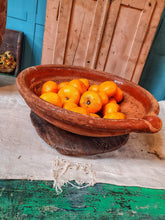 Load image into Gallery viewer, French Antique 19th Century Gassoutlet Dairy Bowl rustic Farmhouse provence pottery brown glazed terracotta sitting on red painted french farmhouse bench primitive wooden kitchen behind bowl is filled with oranges dusty gems interiors nantwich
