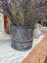 Load image into Gallery viewer, Vintage French Paint Kettle Industrial rustic Modern rustic  filled with fresh lavender on french country kitchen table infront of antique french bee hive and french country pottery. perfect for the cottage core aesthetic dusty gems interiors nantwich 