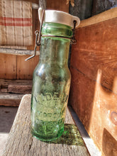 Load image into Gallery viewer, Vintage French Country L&#39;Ideale glass storage Bottle  French charm french country rustic kitchen ideas hand blown glass dusty gems interiors Nantwich