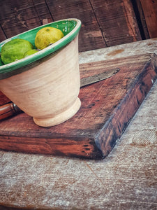 French Antique Country Farmhouse Chopping Board on Antique Rustic itchen primitive Table sourdough bread and bread knife French country pottery green glazed bowl with Limes Dusty Gems Interior shop Nantwich