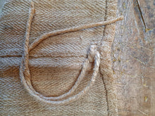 Load image into Gallery viewer, Antique Hungarian Rustic Linen Hemp Grain sack Farmhouse Laundry Bag Hand woven handsewn rustic vintage linen on French country split leg stool grain sack fabric dusty gems interiors nantwich antiques