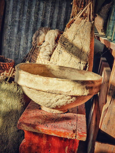 Vintage Indian Paper Mache Bowl Rustic Mediterranean Beach House sitting on Swedish country red painted bench with french 19th centruy beehives in the background Dusty Gems Interiors Nantwich 