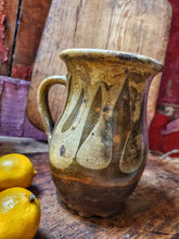 Load image into Gallery viewer, Antique French Cream Pot storage pot  Rustic country Farmhouse Confit Pot 19th Century. yellow and green glaze. sitting on french 19th century copping board with lemons and another french farmhouse cutting board in the background dusty gems interiors Nantwich 