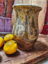 Load image into Gallery viewer, Antique French Cream Pot storage pot  Rustic country Farmhouse Confit Pot 19th Century. yellow and green glaze. sitting on french 19th century copping board with lemons and another french farmhouse cutting board in the background dusty gems interiors Nantwich 