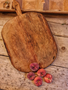 Antique French Country Chopping Board Charcuterie Pizza on french farmhouse table with fruit peaches and cherries cheese board and sourdough bread primitive kitchen dusty gems interiors nantwich