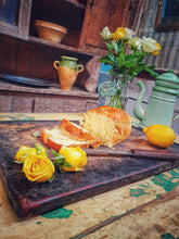 Load image into Gallery viewer, Antique French Rustic Farmhouse Primitive Cutting Board Charcuterie on painted french farmhouse table with vintage enamel green coffee pot confit pot and white and yellow roses in glass storage jar with swedish country furniture in the background. dusty gems interiors Nantwich 