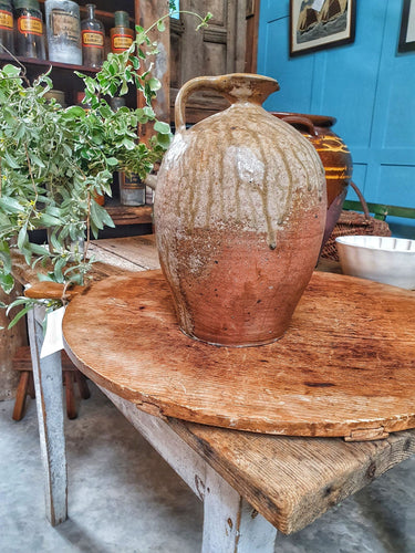 Antique French Country Rustic Walnut Oil Storage Jar French country pottery confit pot 19th century sitting of frnch farmhouse chopping board on french farmhouse table Antique ceramic, dusty gems intewriors nantwich 